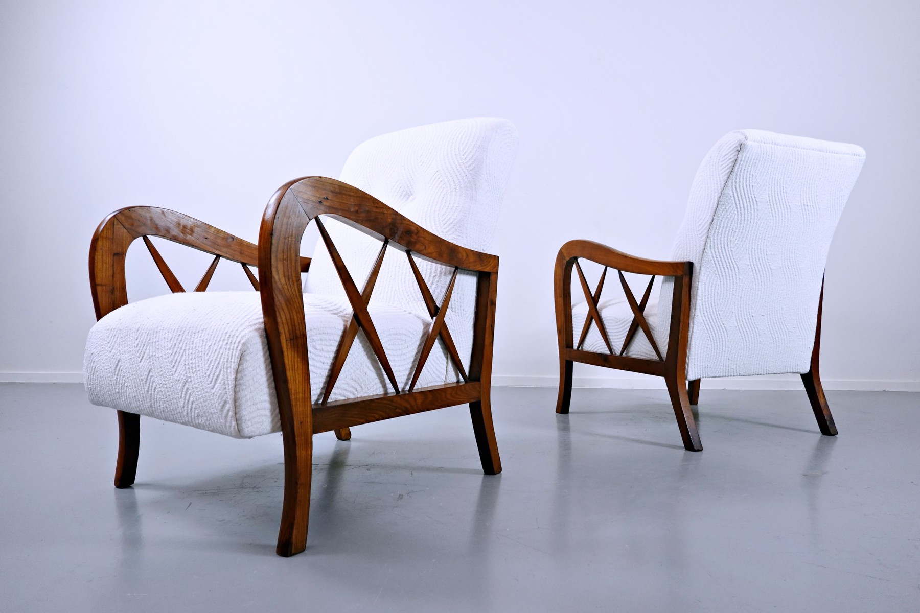 pair-of-armchairs-in-the-style-of-paolo-