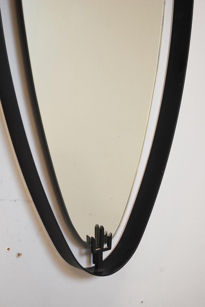 oval-mirror-in-iron-by-santambrogio-y-de