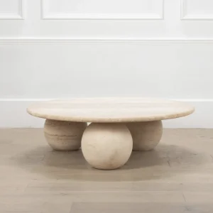 Contemporary round travertine coffee table